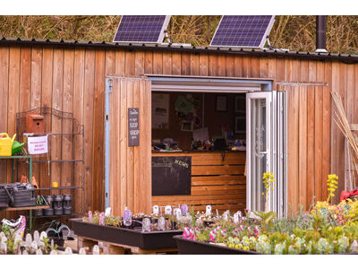 Shipping Container Conversions 40ft Siberian Larch cladded garden centre CS26667 click to zoom image