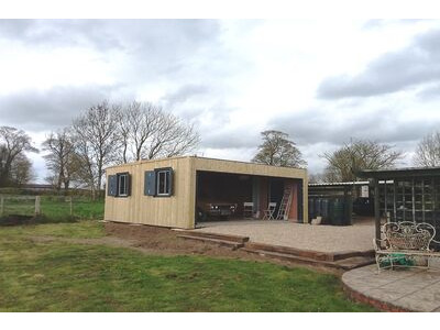 Shipping Container Conversions 20ft x 20ft CarTainer with roller shutter and cladding